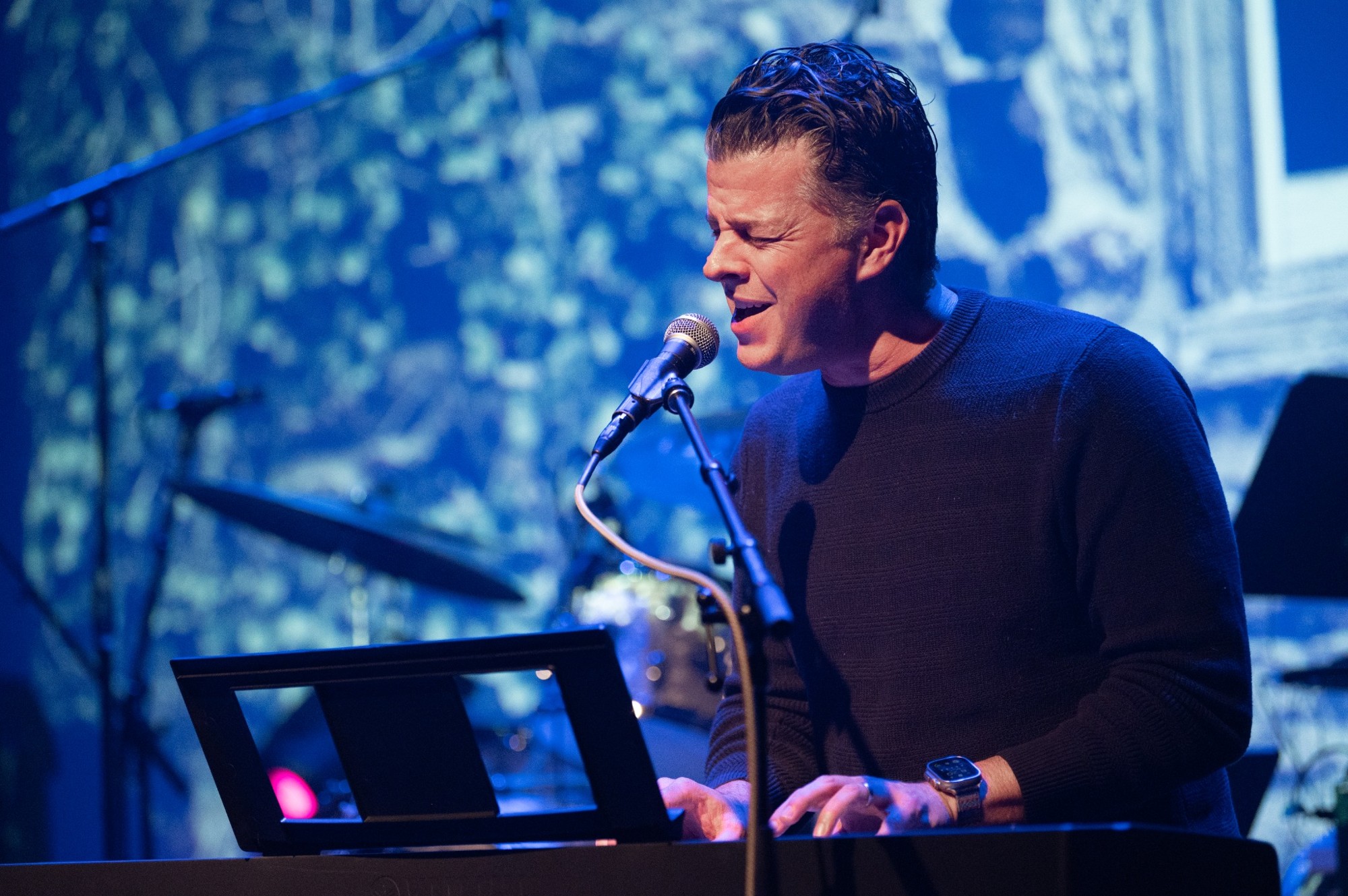 Matt Dorsey singing at the keyboard
